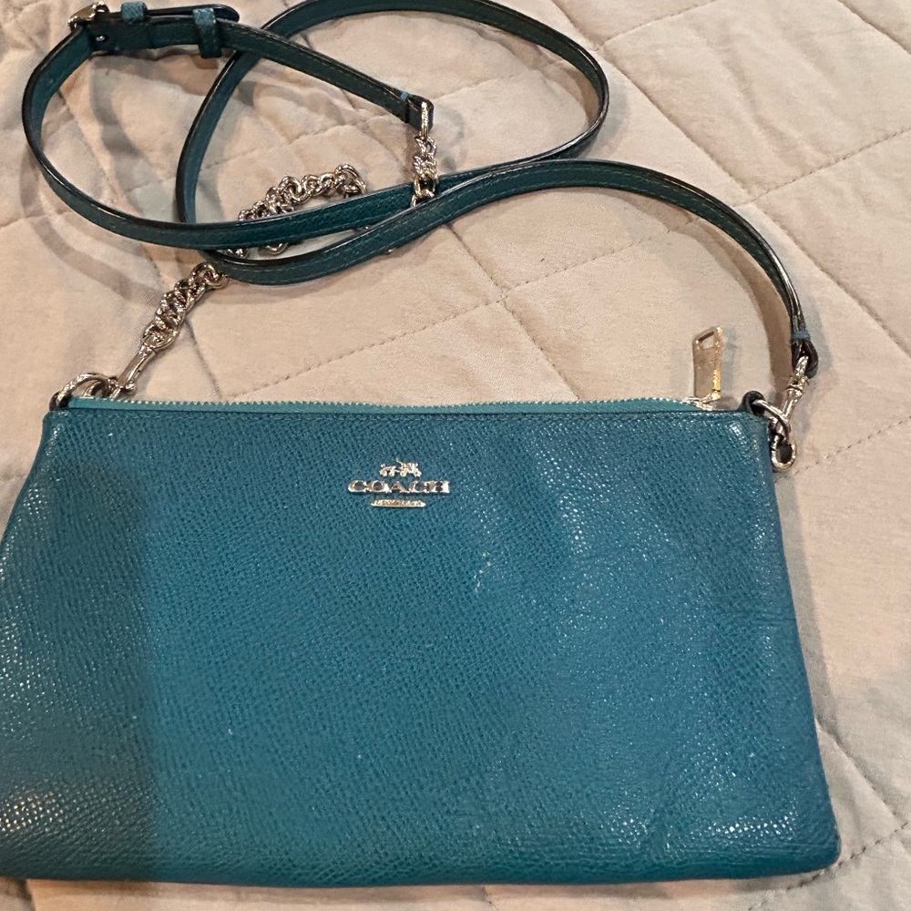 Coach crossbody with chain strap.  Turquoise color.